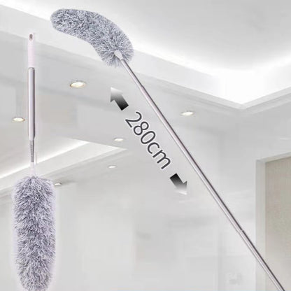 Extendable cleaning brush with feather duster head against a white ceiling background