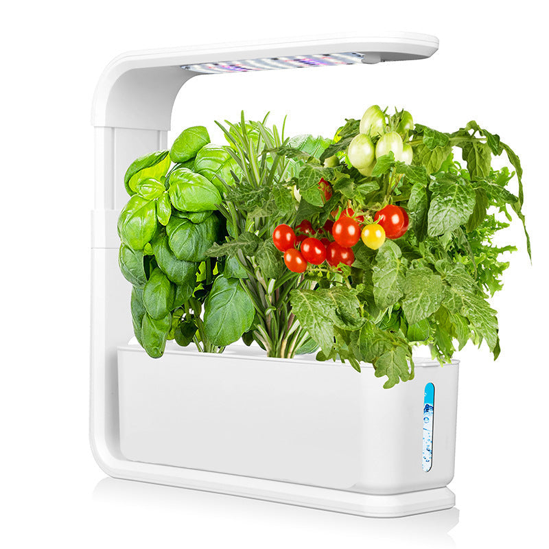 White indoor gardening system with plants and LED lights on a white background